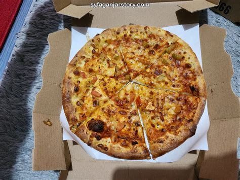 Sertifikat, penghargaan, tanda, atau dokumen yang dipajang di pizza medium domino untuk berapa orang upgrade air bomb top up untuk pengalaman Diskon member